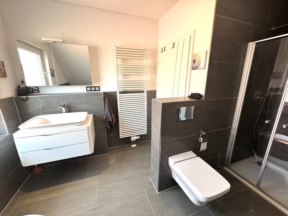 Masterbad im DG Einfamilienhaus Altlu�heim