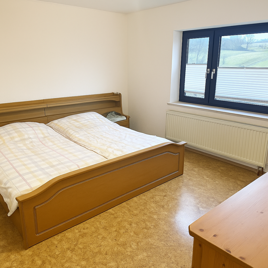 EG: Schlafzimmer Zweifamilienhaus Dielheim